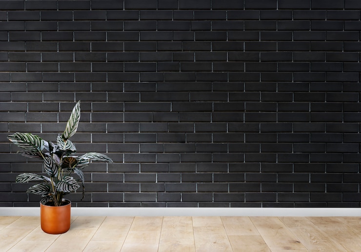 Gratis Bild rum med en svart tegelvägg