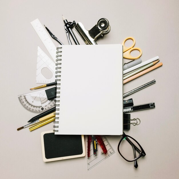 sketchbook on office supplies