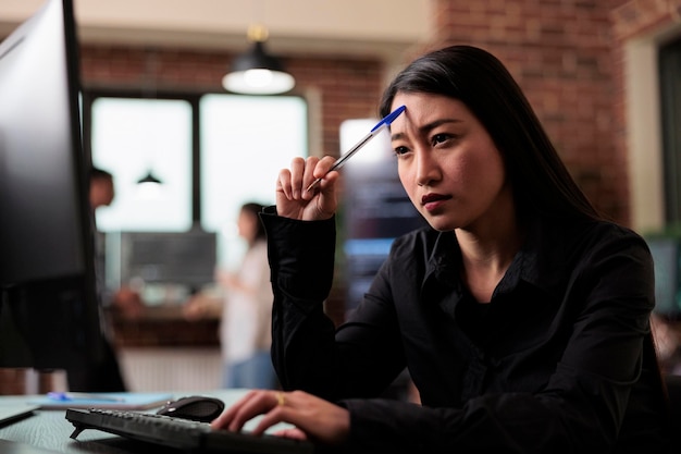 Thoughtful software developer thinking of ways to upgrade encryption program. Pensive network engineer reflecting at failed data processing operation and security system unknown breach.