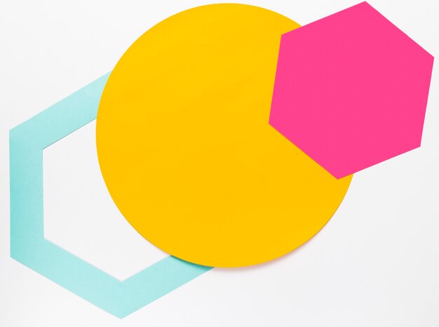 top view yellow circle with colorful geometric shapes