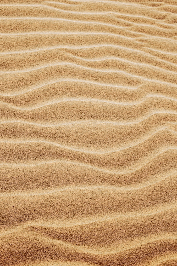 Gratis Bild vertical shot of the patterns on the sands in the desert