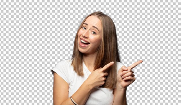 smiling cheerfully and pointing to copy space on palm on the side showing or advertising an object