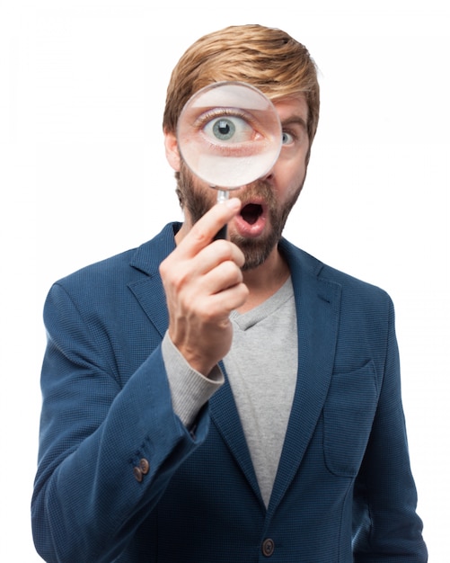 worker playing with a magnifying glass