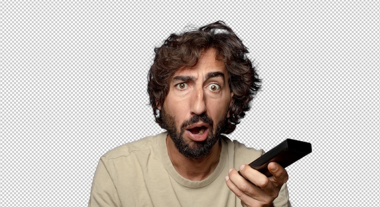 Gratis PSD young adult bearded man with a tv remote control