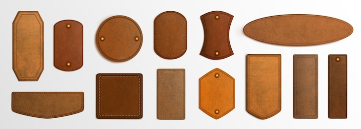 Gratis Vektor realistic set of genuine leather labels