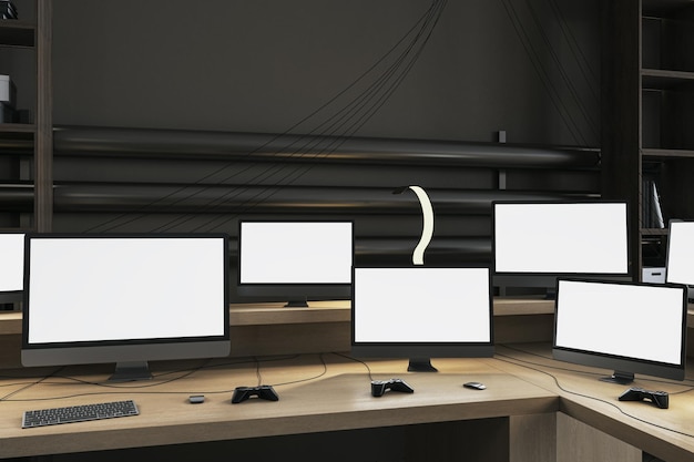 A computer desk with several monitors and a black background.