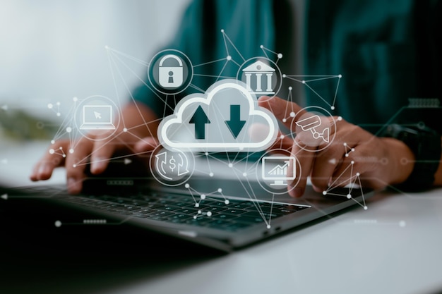 A man uses a laptop that has a diagram of cloud computing on it Concepts of data storage networking and internet service for cloud technology