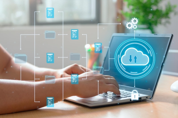 a man utilizes cloud computing technology on his laptop for data transmission storage backup