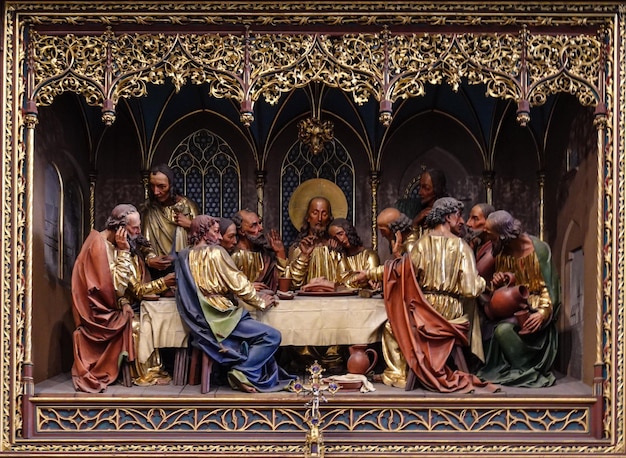 A painting of the last supper with people