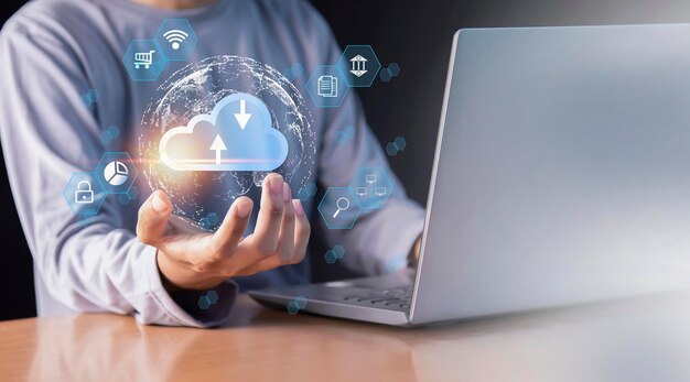 A person holding a cloud computing device with icons on the screen