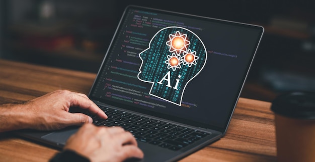a person is typing on a laptop with a brain on the screen