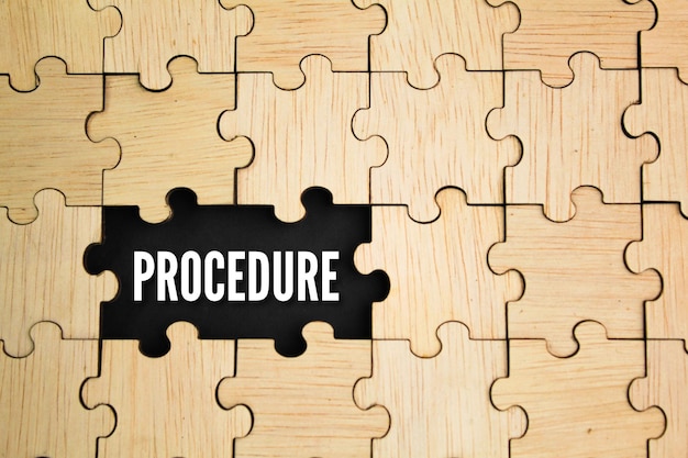 a piece of puzzle that says  process  on the top