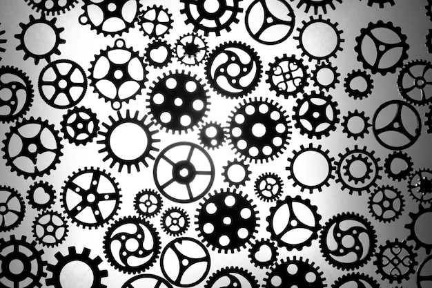 Abstract background black silhouettes variety gears on white background