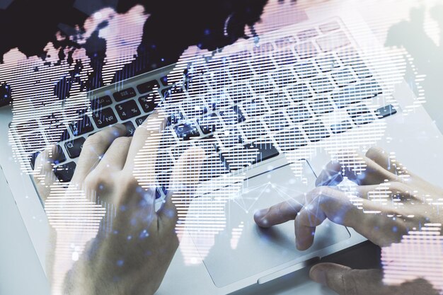 abstract creative digital world map and hands typing on laptop on background globalization concept multiexposure