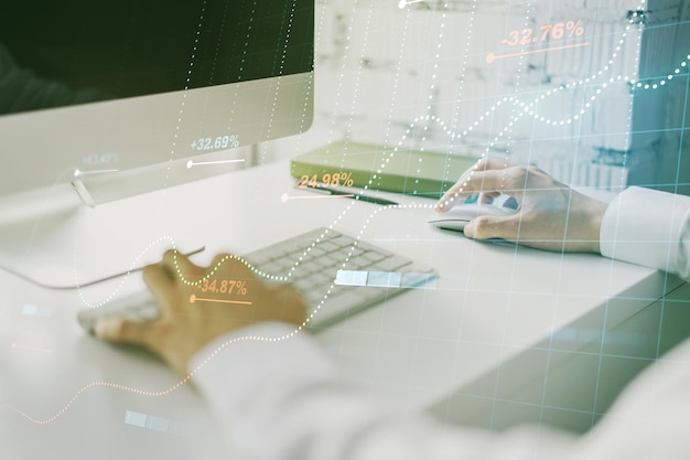 abstract creative stats data concept with hands typing on laptop on background multiexposure