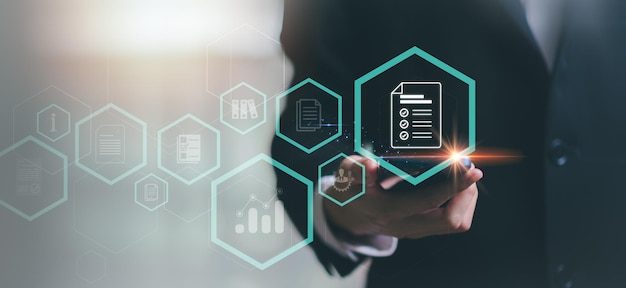 accountant showing office document auditing concept checkboxes concepts of practices and policies company articles of association terms and conditionsx9plan review process and assess correctness