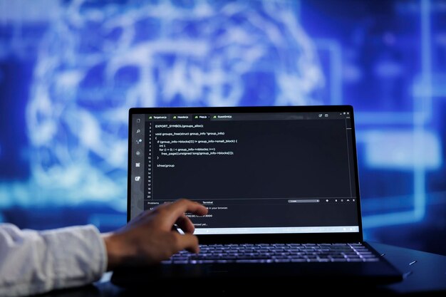 Admin writes code on laptop to visualize artificial intelligence neural networks using augmented reality technology, close up. Expert running AI script for data processing, blurry background