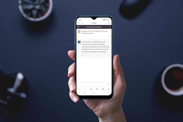 Artificial intelligence chat app on phone display in hand