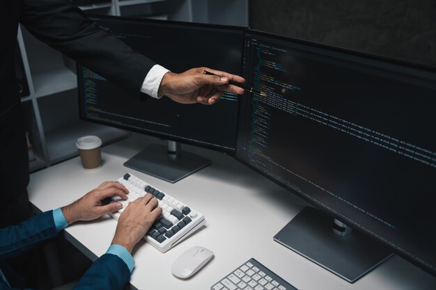 Asian IT Programmer Working on Desktop Computer Male Specialist Creating Innovative Software Engineer Developing App Program