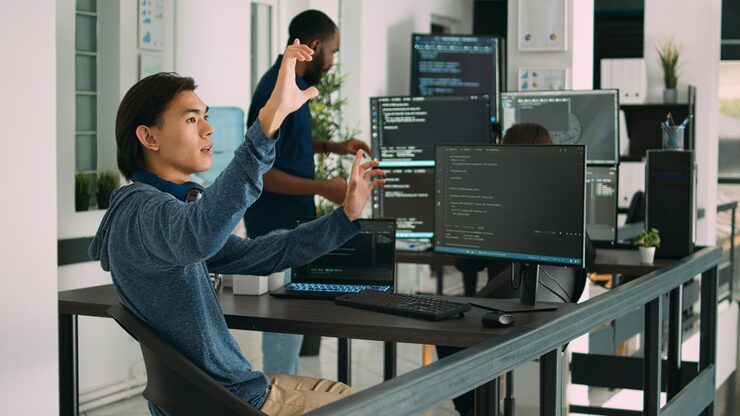 Photo asian web developer working with hologram and augmented reality to create security system. using holographic image and new interface for cloud computing, database code programming.