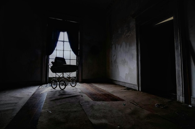 baby carriage in abandoned room
