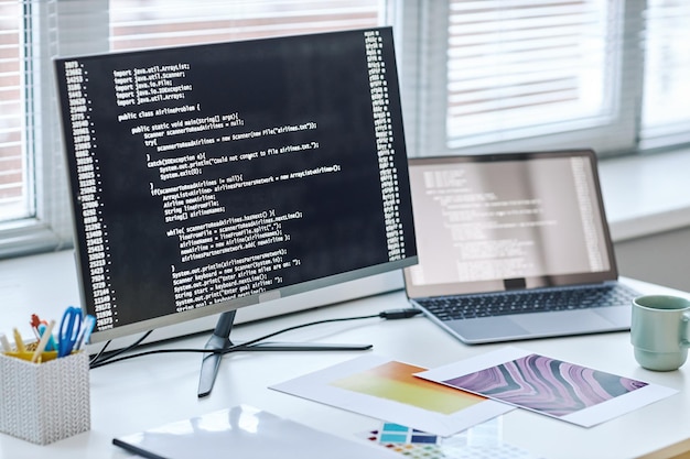 Background image of computer screen with code lines