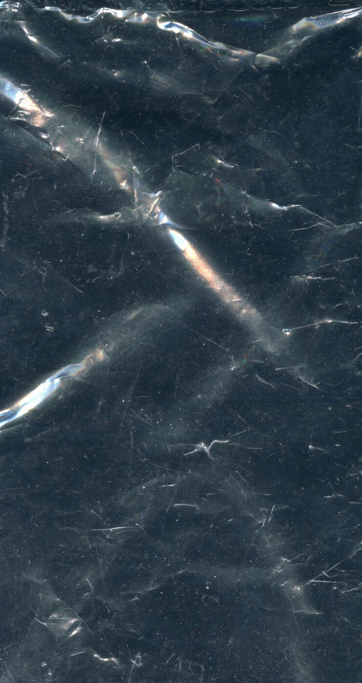 Photo background texture of dark polyethylene
