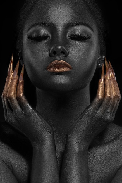 beautiful woman portrait in gold and black colors