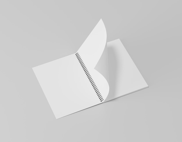 Blank open spring notebook on the empty background notepad sheet