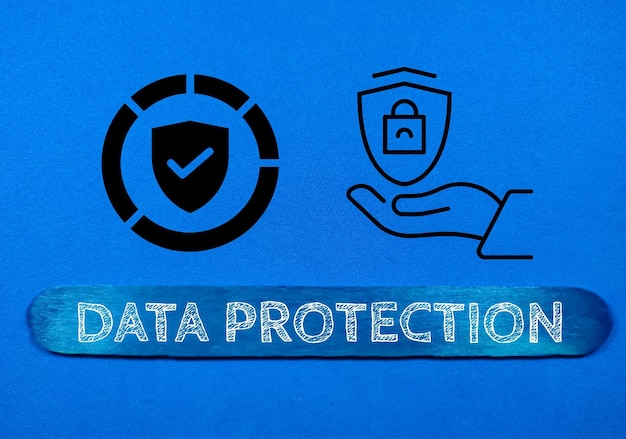 Business conceptText DATA PROTECTION writing on colored ice cream stick with simple icon on a blue background