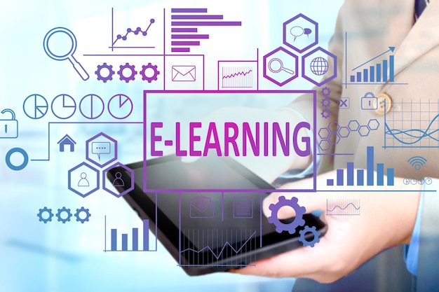 Business Education Concept Businessman click elearning button on his tablet e Learning