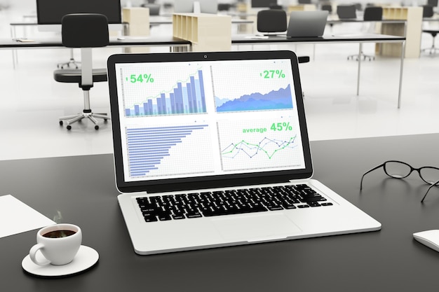 Business graph on laptop screen on black table with cup of coffee and eyeglasses
