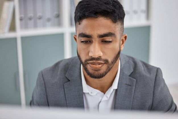 business man computer and website in office planning and online for software development male person networking and coding or programmer in workplace employee and reading report for research