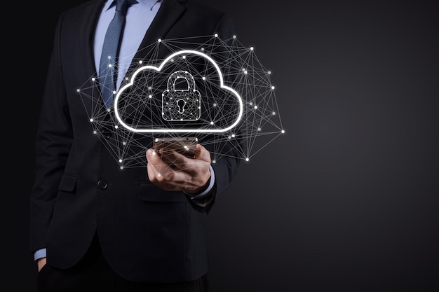 Business man hold,holding cloud computing data and security on global networking,Padlock and cloud icon. Technology of business.Cybersecurity and information or network protection.internet project