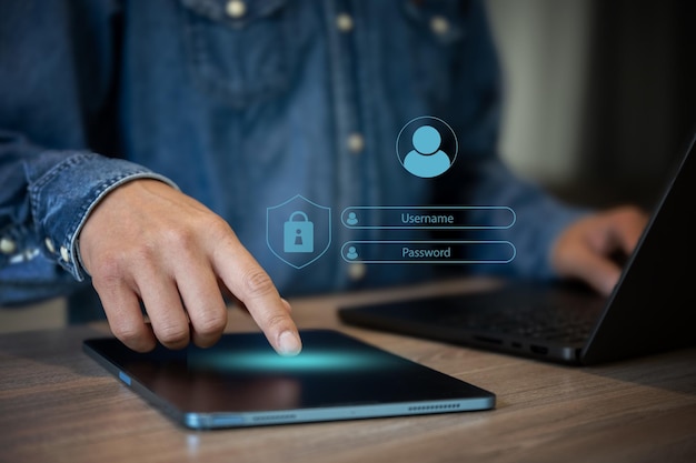 Business man work with laptop use electronic pen to key username and passwork are floating on screen