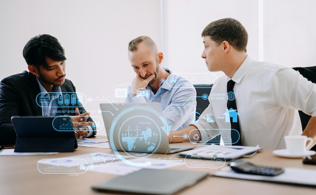 Business team working virtual modern smartphone to reduce CO2 emissions carbon footprint climate change to limit global warmingSustainable development and green business concept at officexA