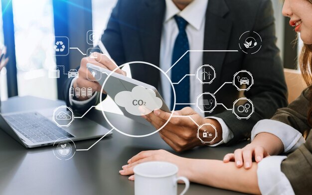 business team working virtual modern smartphone to reduce co2 emissions carbon footprint climate change to limit global warmingsustainable development and green business concept xa
