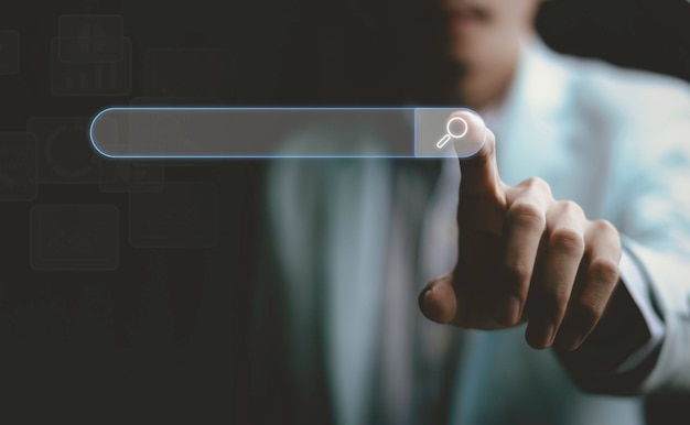 Businessman are touching the virtual screen on search engine optimization for find data on networking SEO Searching Browsing Internet Data Information Networking Concept