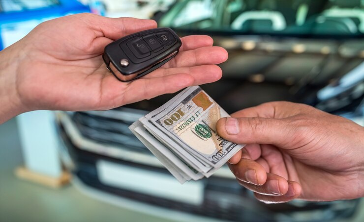 Photo businessman buys a new car. finance concept