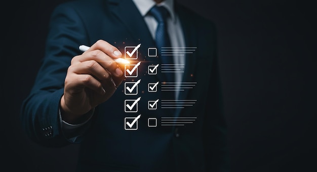Businessman checking items on a checklist