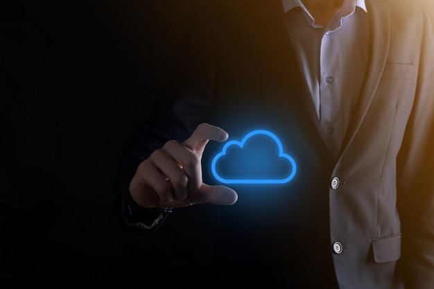 Businessman hand holding holographic cloud computing