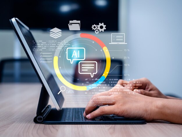 Businessman hands typing on tablet keyboard with virtual AI agent interface and data analytics graphics representing AI automation smart assistant technology and datadriven digital transformation