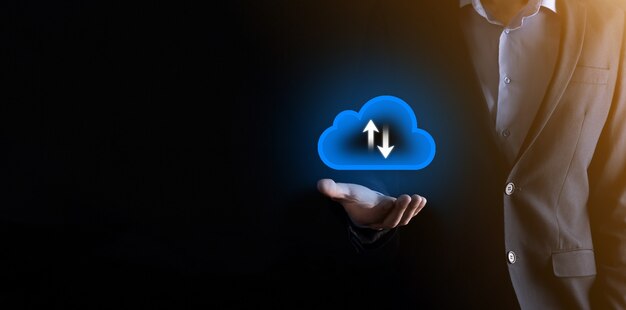 Businessman hold cloud icon.Cloud computing concept - connect smart phone to cloud. computing network information technologist with smart phone.Big data Concept.
