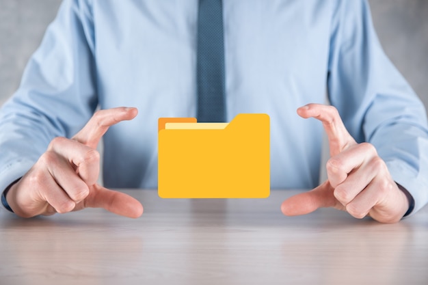 Businessman hold folder icon