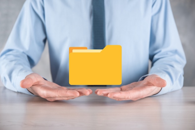 Businessman hold folder icon
