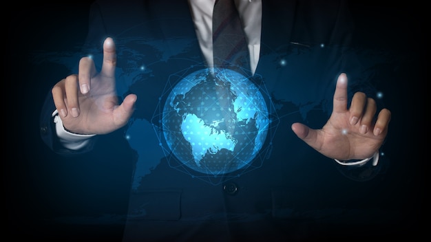 Businessman pointing spot on the global networking connection and communication network, Business network concept