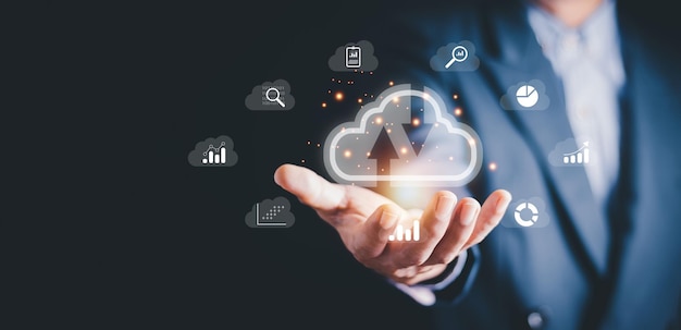 Businessman showing virtual glowing cloud computing to download and loading data information
