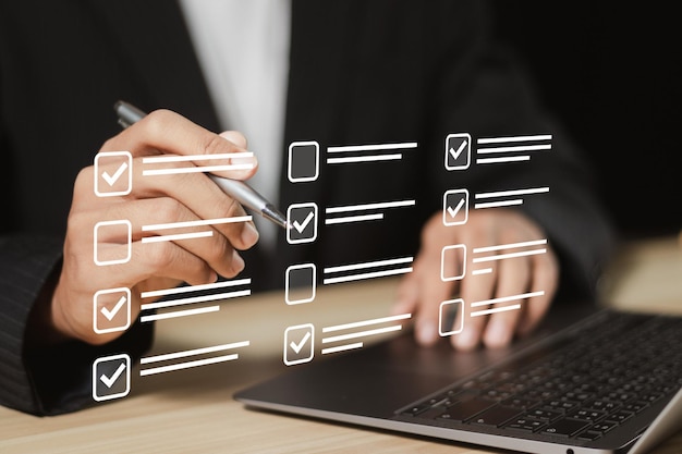 businessman ticks checklist and takes online assessment survey test for online survey form concept filling survey form answer questions of test