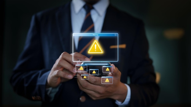 businessman using a smartphone with a sign warning of online crime risks accessing websites