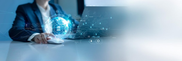 businessman using laptop on global network connection of online banking fintech data exchange